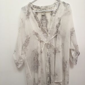 Long sheer blouse with front tie